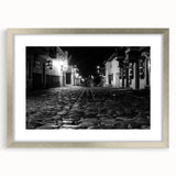 Extra large abstract art print of a textured Barcelona cityscape in muted colors, framed in silver.