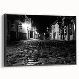 Black and white wall art of Barcelona landscape on framed canvas, suitable for bedroom ambiance.