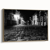 Framed canvas depicting a vintage Barcelona landscape in muted gold and black tones, suitable for bedroom decor.