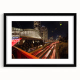 Extra large abstract art print of Tel Aviv skyline in vibrant colors on textured canvas, ideal for living room decor.