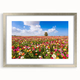 Abstract textured art print of Middle Eastern scenery in muted earth tones, framed with a silver mat.