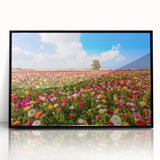 Large abstract wall art depicting a Middle-Eastern scenery in muted earth tones, framed in black acrylic.