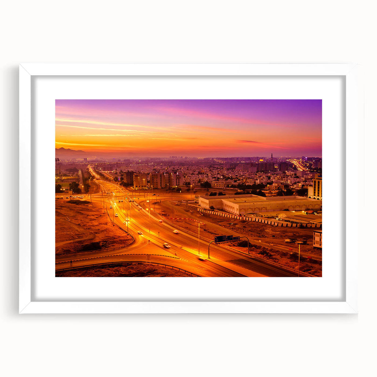 Abstract art print of a Middle Eastern landscape in earthy tones on a white framed canvas, suitable for dining room decor.