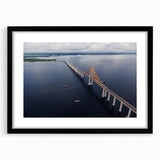 Extra large abstract art print of a vibrant, colorful Brazilian landscape on textured canvas, framed in black.