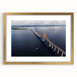 Extra large, textured abstract art print of a stylized Brazilian landscape in muted earth tones, framed in gold.