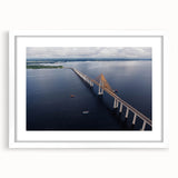 Abstract art print of a Brazilian landscape in muted greens and browns on a framed white mat.
