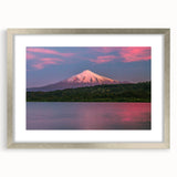 Textured abstract art print of a Chilean landscape in muted earth tones, framed in silver, ideal for bedroom wall decor.