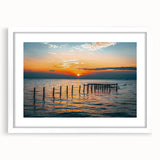 Abstract art print of a vibrant Alabama landscape in a white frame, ideal for dining room decor.