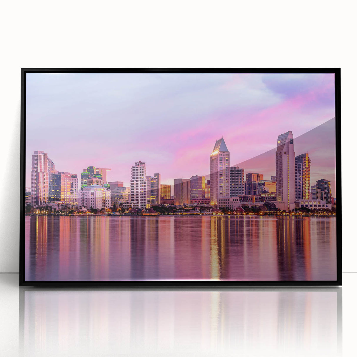 Large abstract wall art depicting a stylized San Diego skyline in muted gray and blue tones, framed in black acrylic.