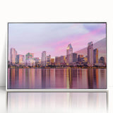 Acrylic print of San Diego skyline in muted gray and blue tones, framed in white, suitable for modern art wall decor.
