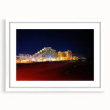 Abstract art print of Daytona scenery in muted blue and green tones on a framed white mat, ideal for dining room decor.