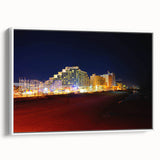 Vintage poster art of Daytona, featuring colorful race cars and crowd, on a framed canvas, suitable for living room decor.