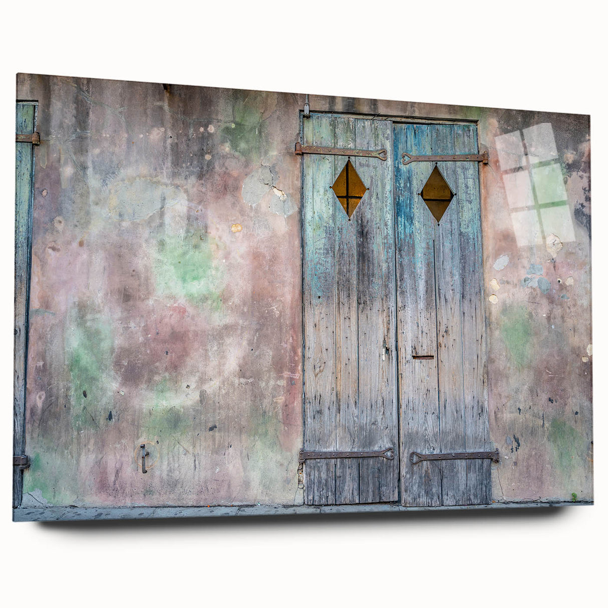 Acrylic print of a large abstract depiction of New Orleans in muted gold and green tones.