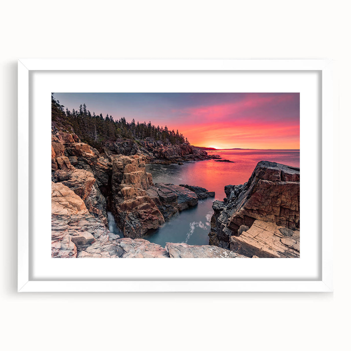 Abstract art print of a serene Maine landscape in muted blue and green tones, framed in white.