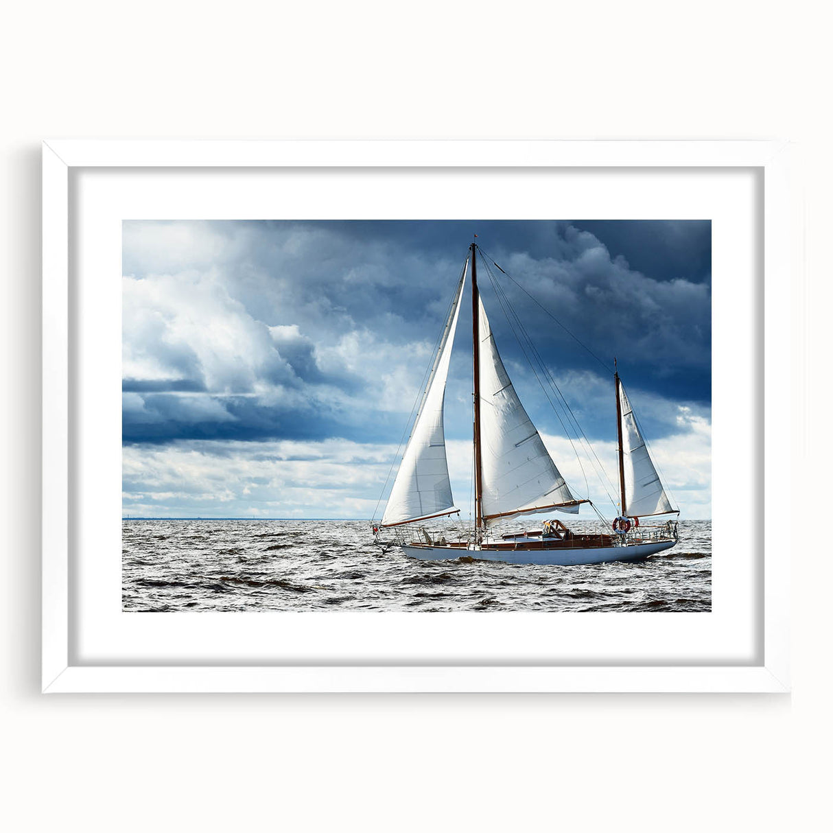 Abstract art print of a Maine landscape in muted blues and greens, framed with a white mat.