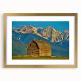 Extra large abstract art print of Montana scenery in gold frame, with textured appearance, suitable for living room decor.