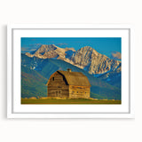 Abstract art print of Montana scenery in muted earth tones on a white matted frame, ideal for dining room decor.