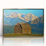Large art print of a Montana landscape in mid-century modernist style, featuring muted earth tones on a framed acrylic.