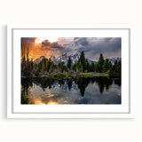 Abstract art print of Grand Tetons in muted earth tones on a white framed mat, suitable for dining room or bedroom decor.