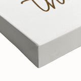 Large art of a black and white landscape painting on stretched canvas, depicting a serene tree in autumn.