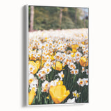 Vintage poster art of spring scene on framed canvas, featuring colorful flowers against a black background.