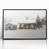 Large abstract wall art depicting winter scene in muted blue and white tones, framed in black acrylic.