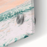 Large abstract wall art in vibrant orange and blue tones on acrylic glass.