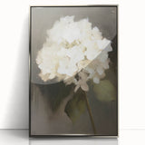 Abstract floral artwork in a sleek silver frame, showcasing vibrant colors and intricate detailing, perfect for modern home decor.