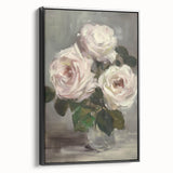 Framed canvas artwork featuring an abstract floral design in vibrant colors, displayed in a sleek black frame, ideal for modern home decor.