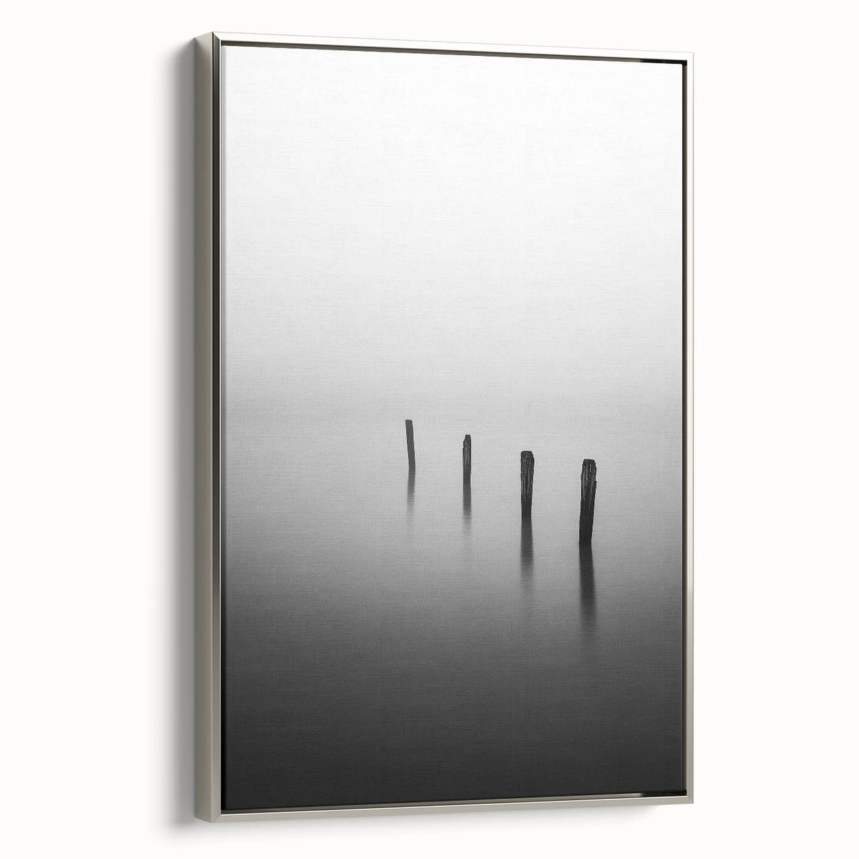 Framed canvas artwork showcasing an abstract landscape in soothing tones of blue and green, set against a sleek silver frame, ideal for modern home decor.