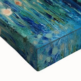 Close-up of a vibrant abstract floral stretched canvas artwork showcasing rich colors and intricate details, perfect for home decor or wall art displays.