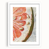Abstract art print featuring an assortment of fruits in vibrant colors on a white framed poster.