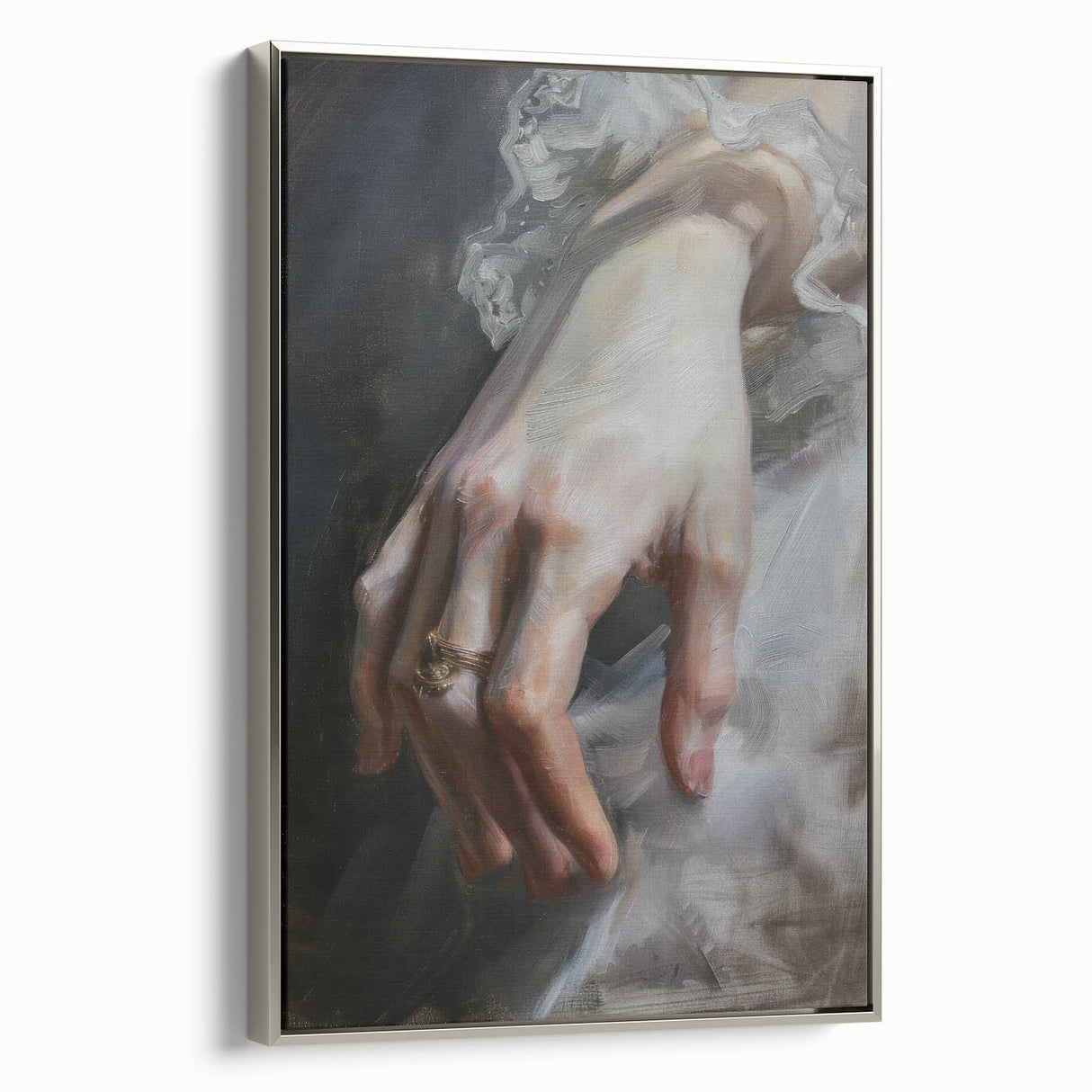 Abstract figurative framed canvas artwork showcasing fluid silver tones, designed to enhance modern interiors with a stylish side view perspective.