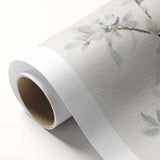 Vibrant rolled canvas art featuring an abstract floral design with bold colors, elegantly displayed in a protective cardboard tube, perfect for home decor.