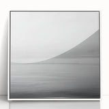Framed abstract landscape artwork featuring soft pastel colors and a contemporary design, displayed in a sleek white frame, perfect for modern home decor.
