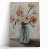 Abstract floral canvas art featuring vibrant pink, blue, and green hues, elegantly leaning against a neutral wall, perfect for modern decor. Ideal for adding a fresh, artistic touch to any room.