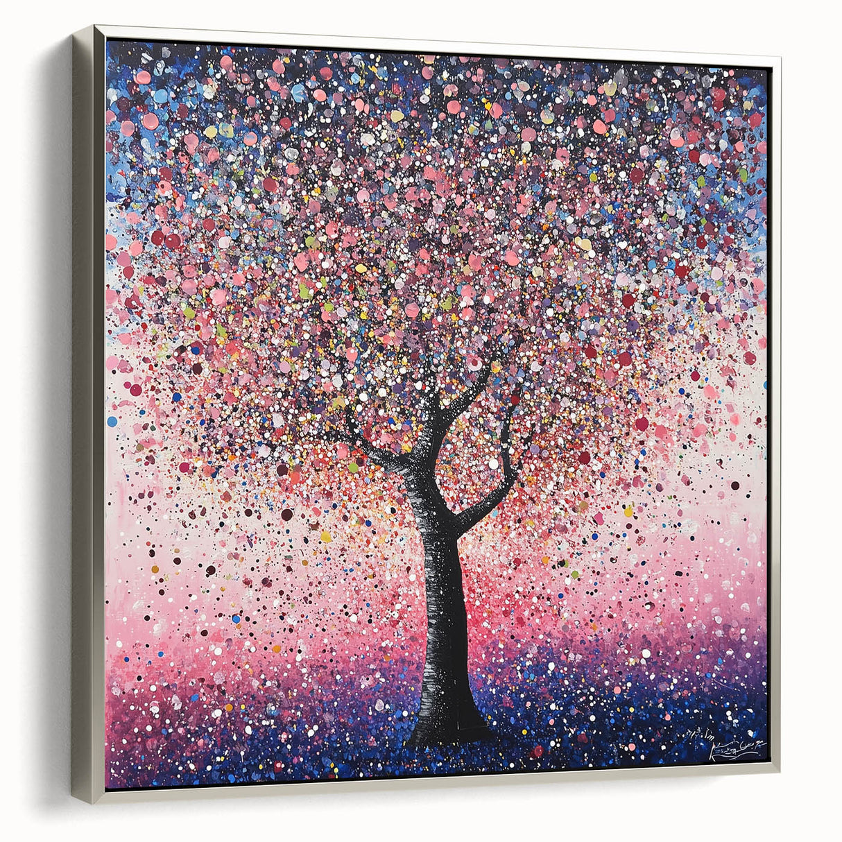 Framed canvas artwork showcasing an abstract floral design in vibrant colors, with a sleek silver frame, ideal for modern home decor and artistic accents.