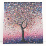 Abstract floral canvas art in vibrant colors, featuring a modern design with soft lines and shapes, leaning against a neutral wall, ideal for home decor.