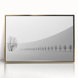 Framed abstract landscape artwork in gold-accented acrylic, depicting a serene natural scene with soft colors and fluid shapes, ideal for modern home decor.