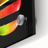 Large abstract wall art featuring assorted fruits in vibrant colors on acrylic glass, suitable for dining room decor.