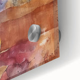 Large abstract wall art depicting autumnal trees in warm orange and yellow tones on acrylic glass.