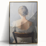 Framed acrylic artwork showcasing an abstract figurative design in gold tones, elegantly displayed against a neutral backdrop, perfect for modern home decor.