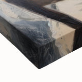 Close-up view of an abstract figurative stretched canvas artwork, showcasing vibrant colors and intricate textures, ideal for modern home decor and art enthusiasts.