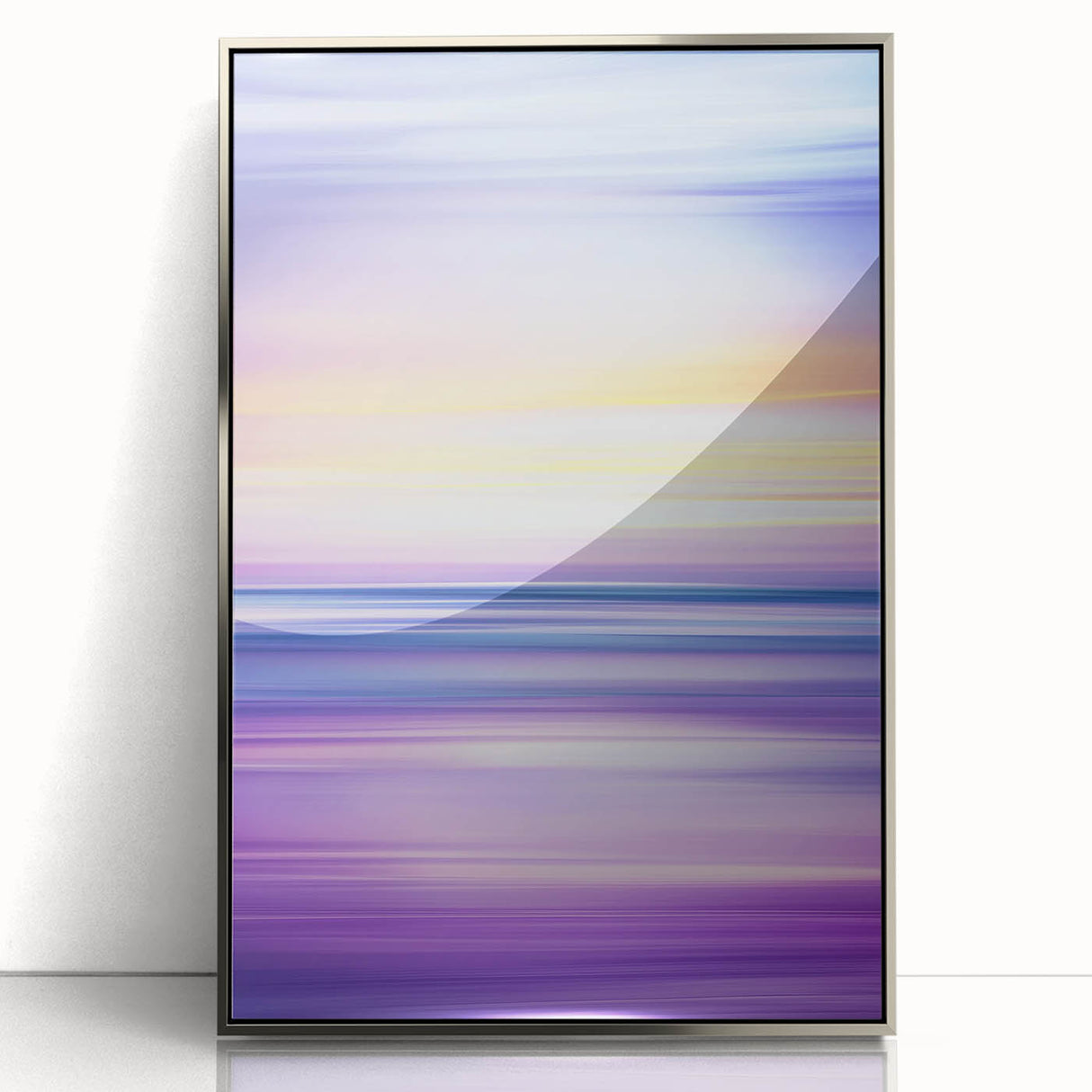 Framed abstract landscape artwork in silver acrylic, showcasing vibrant colors and dynamic shapes, perfect for modern home decor. Ideal for enhancing interior aesthetics.