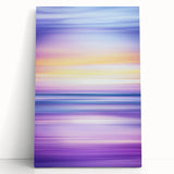 Abstract landscape stretched canvas art featuring vibrant colors and fluid shapes, leaning against a white wall, perfect for modern home decor.