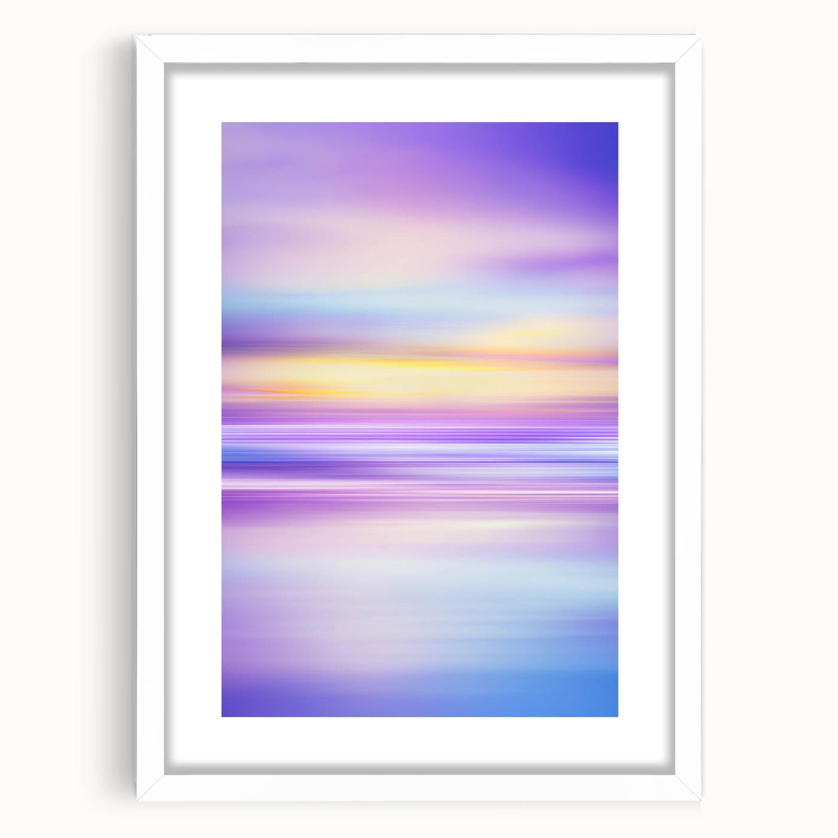Abstract landscape art print in a white frame with a mat, showcasing vibrant colors and dynamic shapes, ideal for modern home decor and gallery displays.
