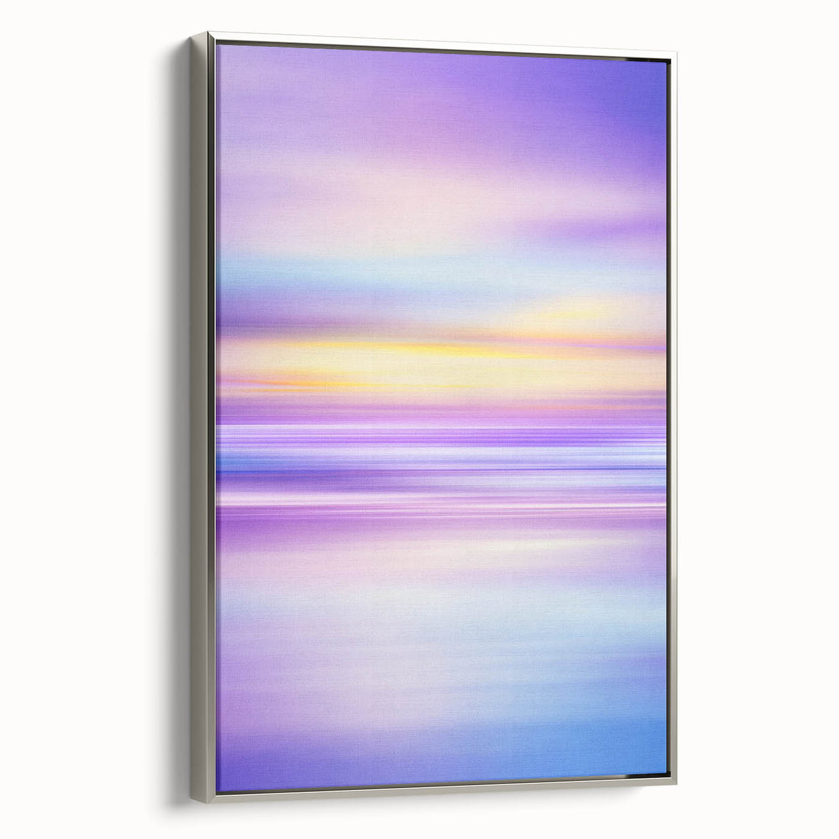 Framed abstract landscape canvas artwork with a silver frame, showcasing vibrant colors and dynamic shapes, perfect for modern home decor.