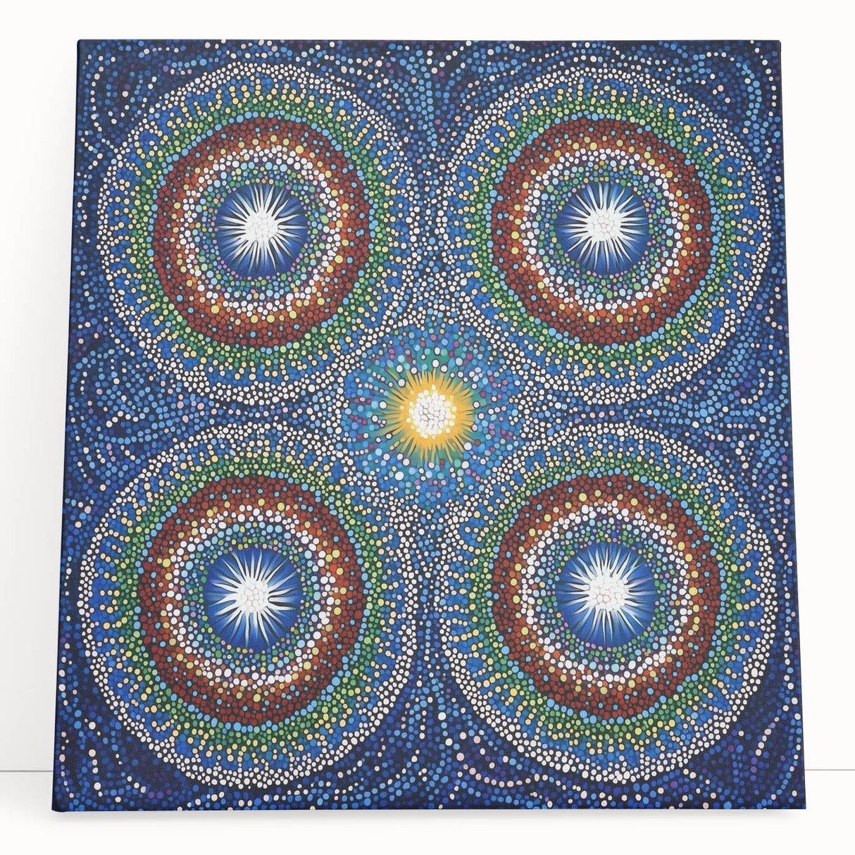 Abstract geometric stretched canvas artwork featuring vibrant colors and bold shapes, leaning against a neutral wall, perfect for modern home decor. This eye-catching piece enhances any living space with its dynamic design and contemporary style.