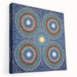 Abstract geometric stretched canvas artwork displaying vibrant colors and intricate patterns, showcasing a modern design suitable for contemporary decor. Ideal for enhancing living spaces or art collections.