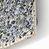 Colorful abstract acrylic splatters on glass, showcasing vibrant hues of blue, pink, and yellow, ideal for modern art decor. Perfect for enhancing artistic spaces.